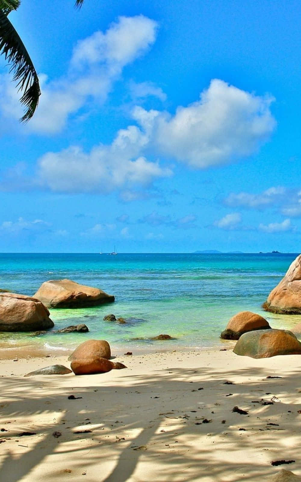 使用 Beach 手機，享受天堂般的溫暖陽光。 壁紙