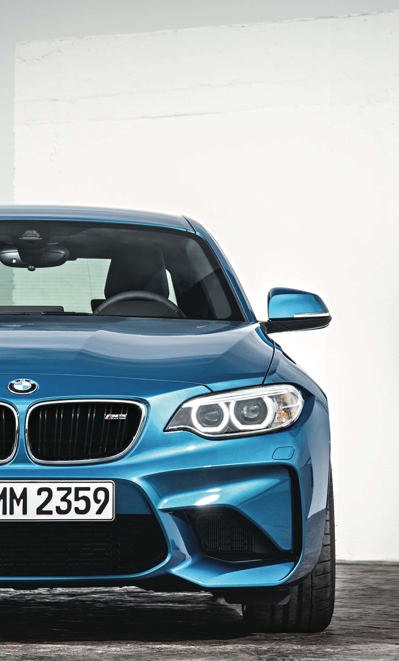 時尚BMW iPhone桌布：優雅跑車與標誌Logo 壁紙