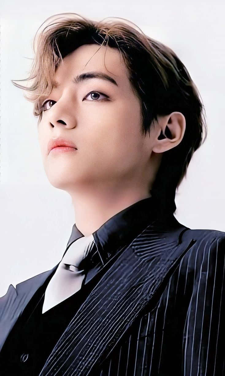 BTS V 在活動現場露出溫暖微笑 壁紙