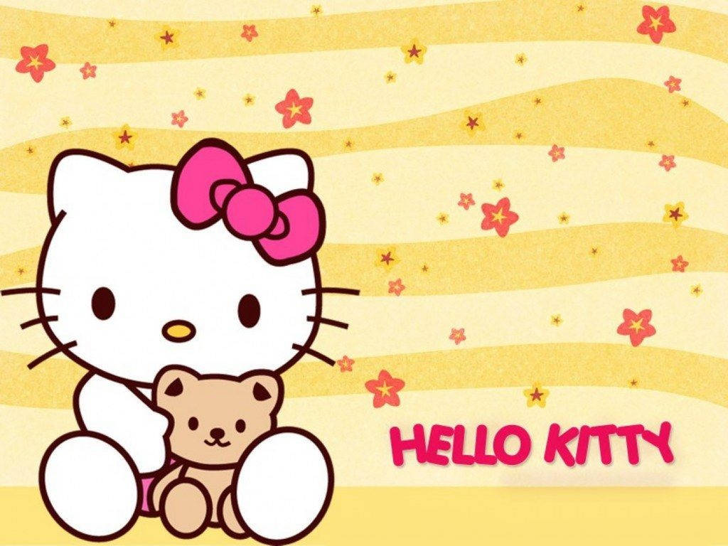 可愛黃色背景中的Hello Kitty 壁紙