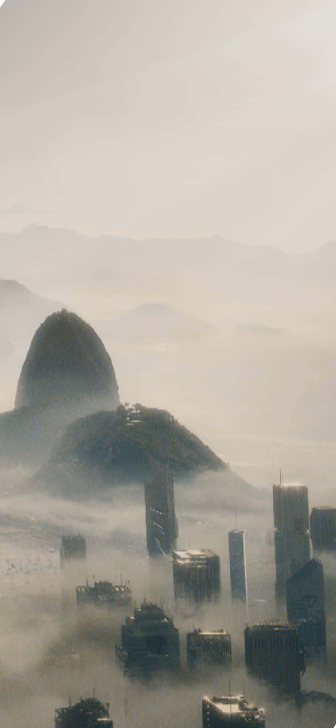 iPhone XS Civilization Beyond Earth 朦朧建築與山巒背景 壁紙
