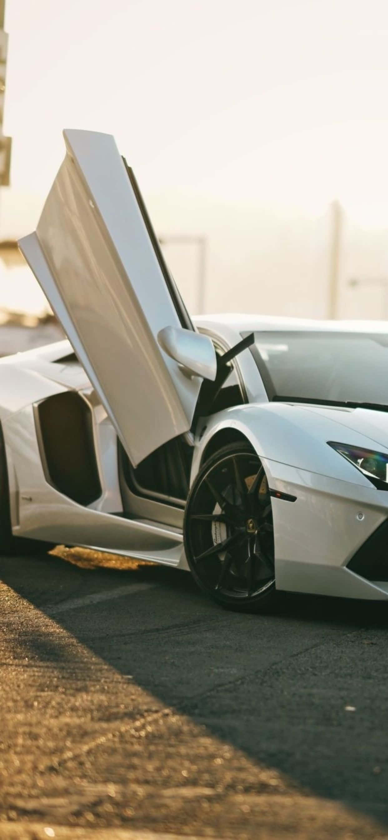 iPhone XS Max 搭配 Lamborghini Aventador Roadster 背景 壁紙