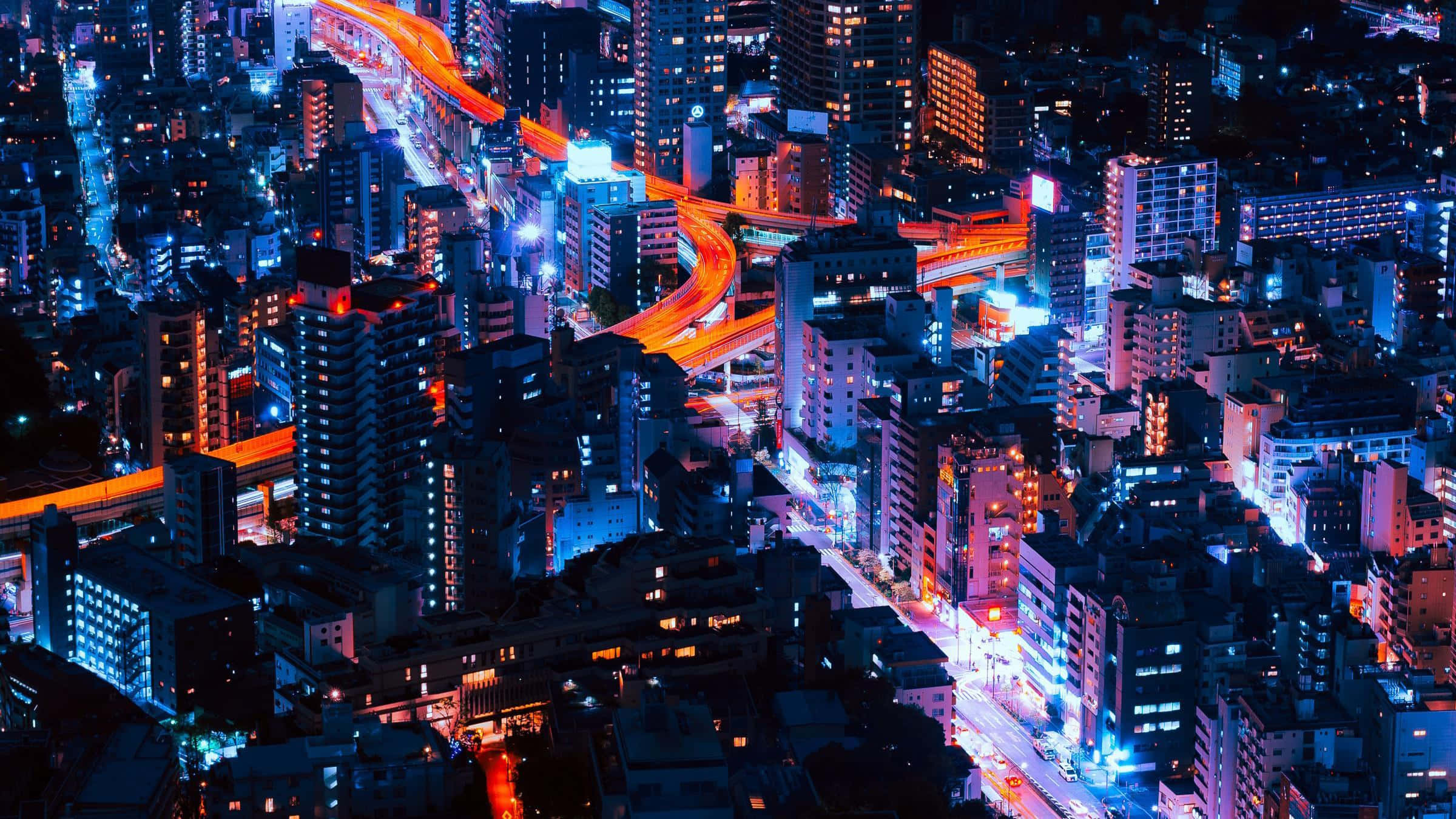 充滿活力的霓虹城市景觀 壁紙