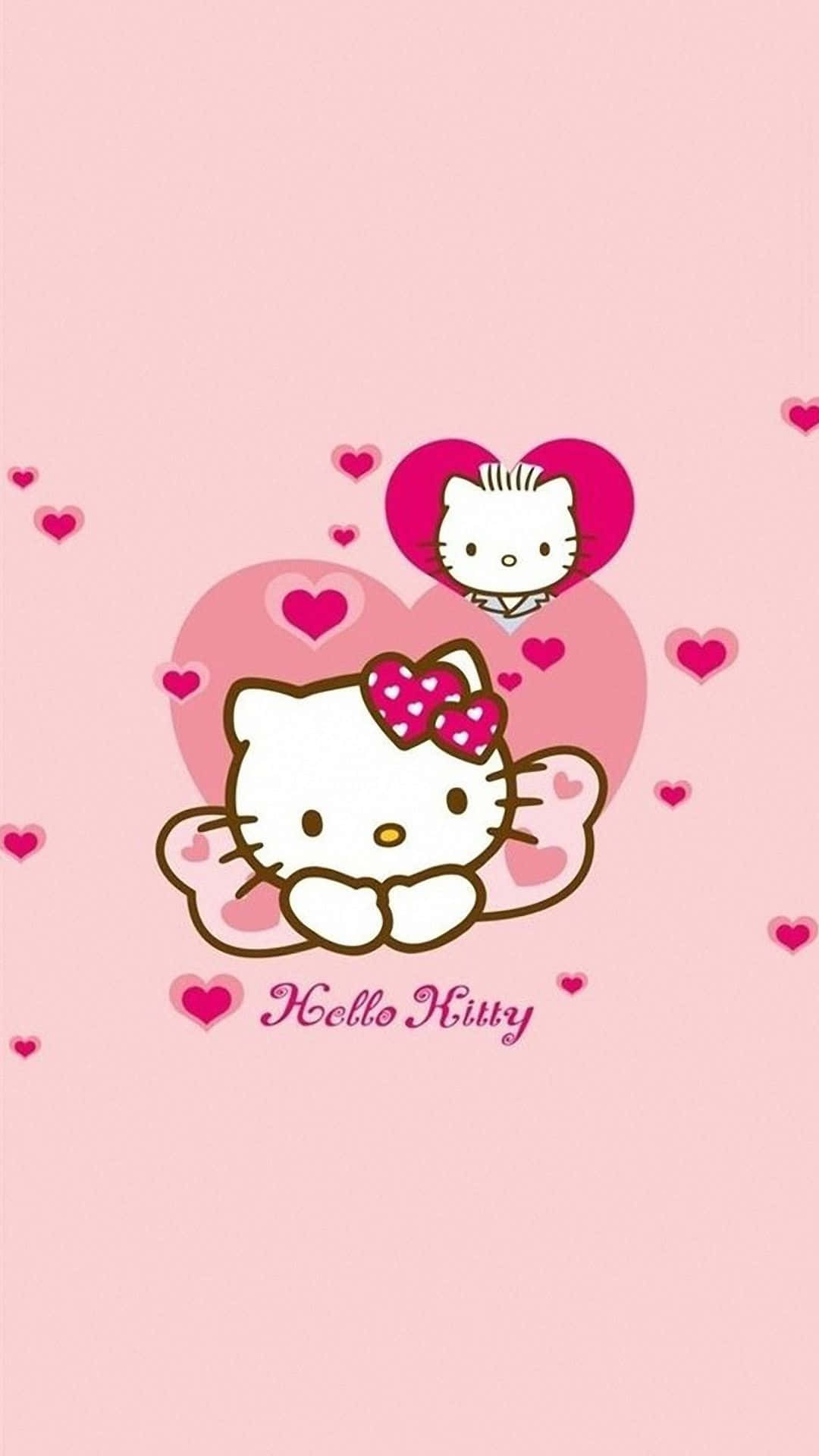 可愛粉紅Hello Kitty倚靠緞帶 壁紙