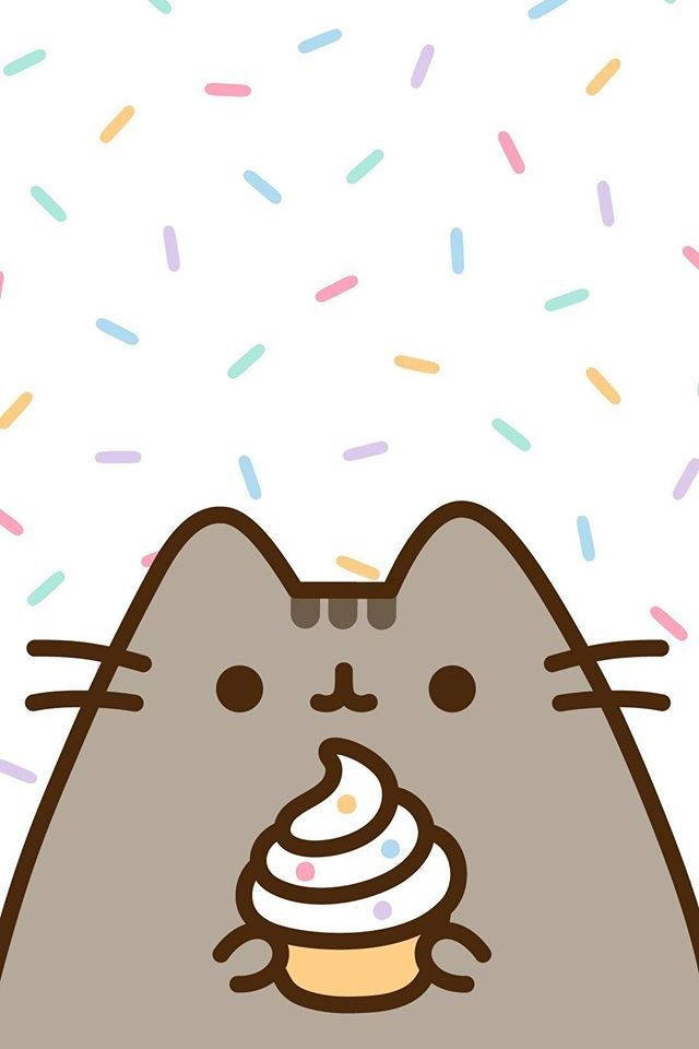 可愛高清 Pusheen 拿著杯子蛋糕 壁紙