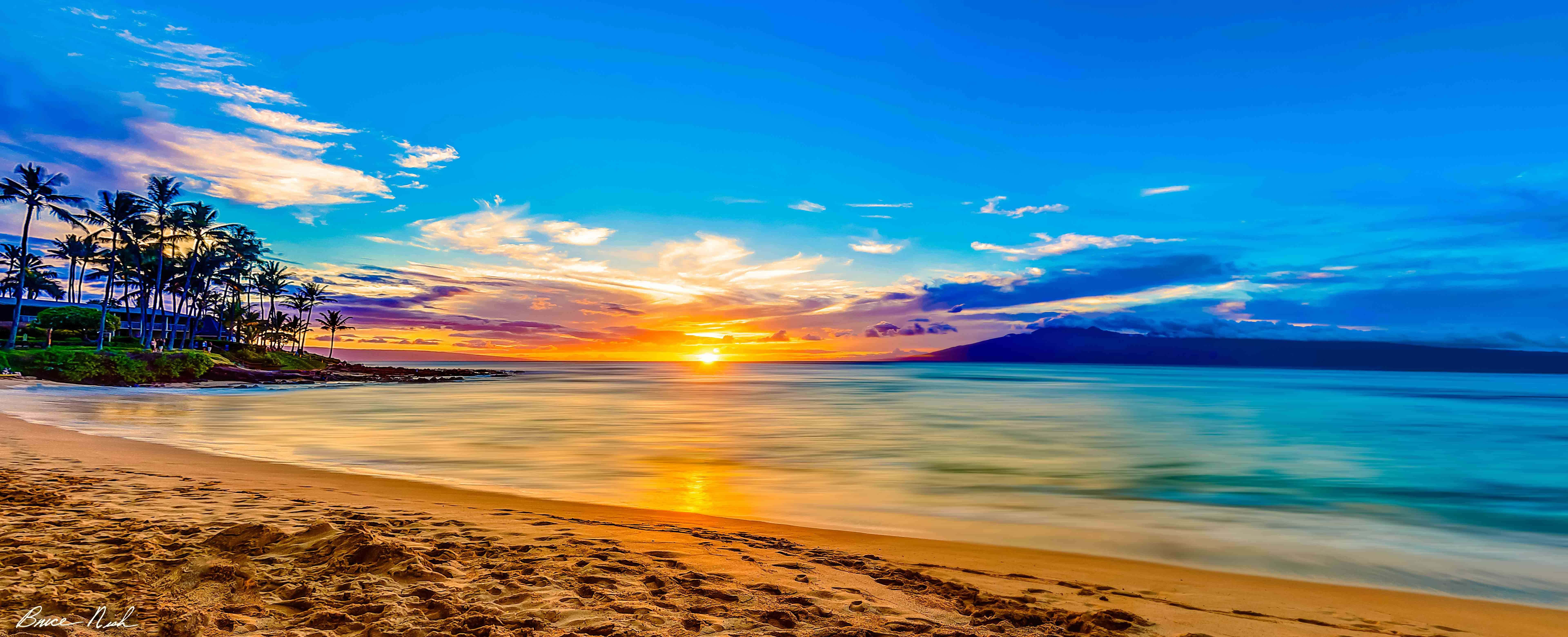 在你最喜愛的海灘擁抱夕陽 壁紙