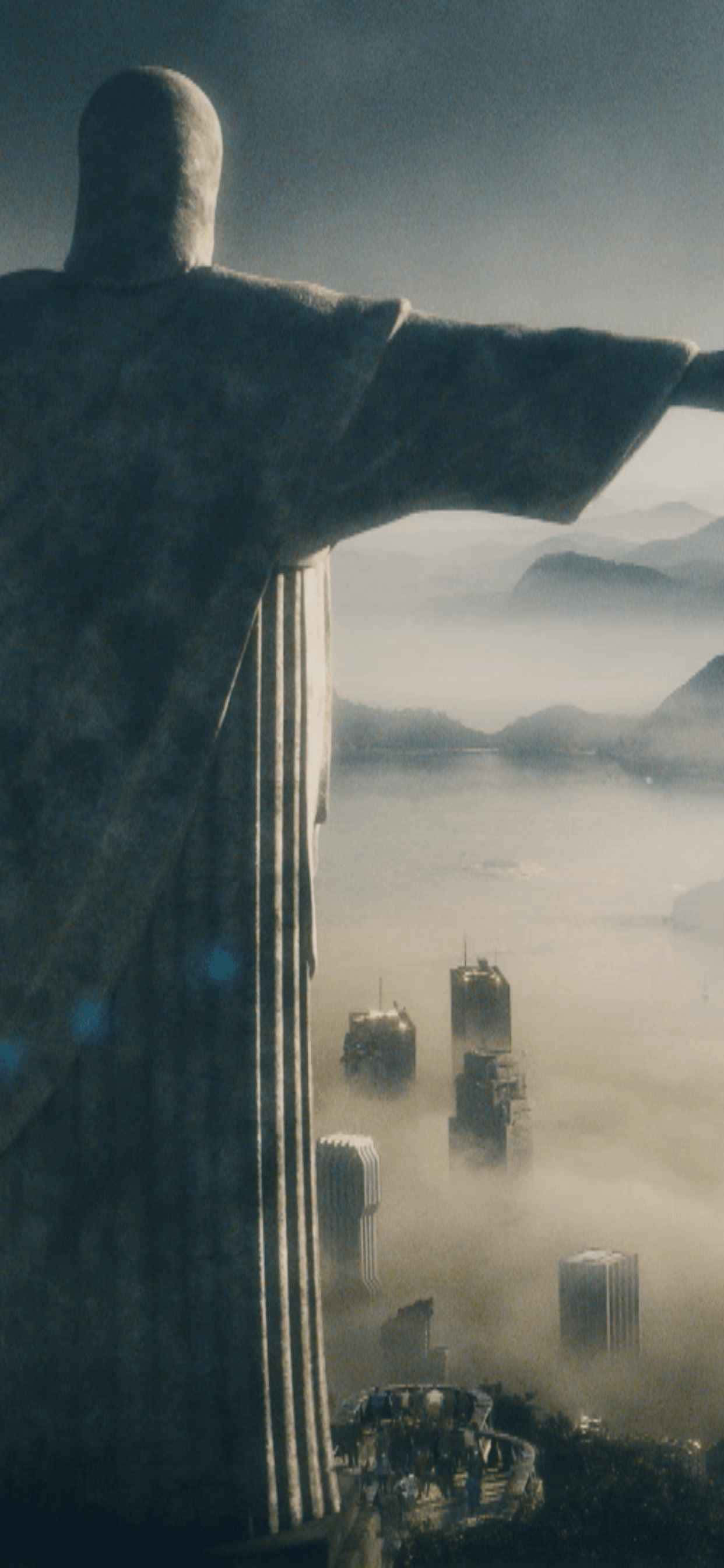 基督雕像與城市背景 壁紙