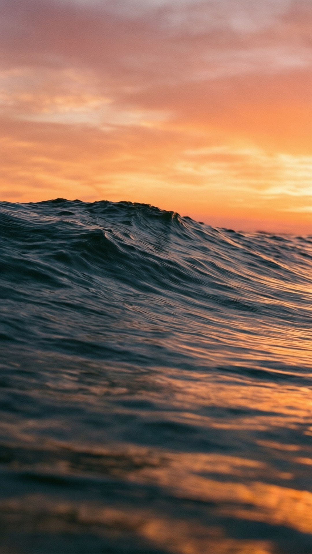夕陽海浪 壁紙