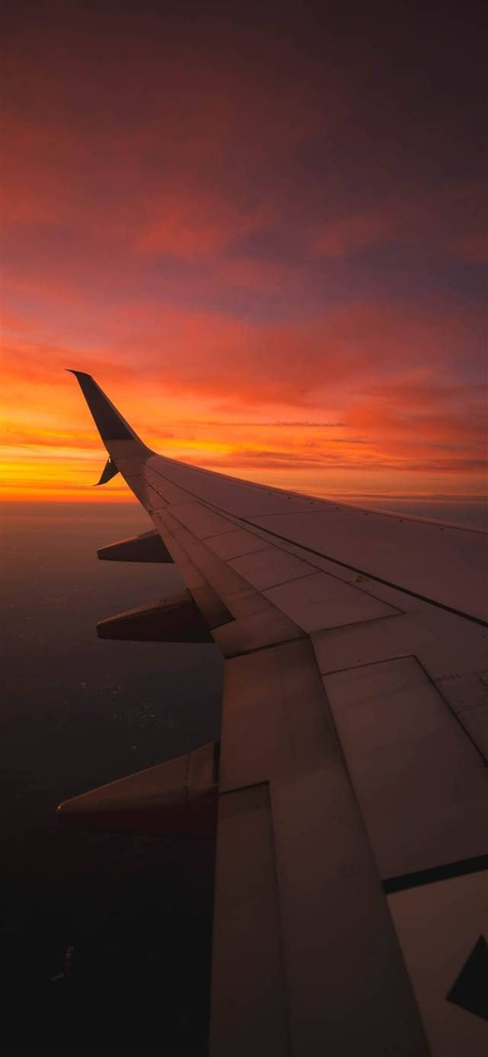 夕陽與飛機機翼 Android 桌布 壁紙