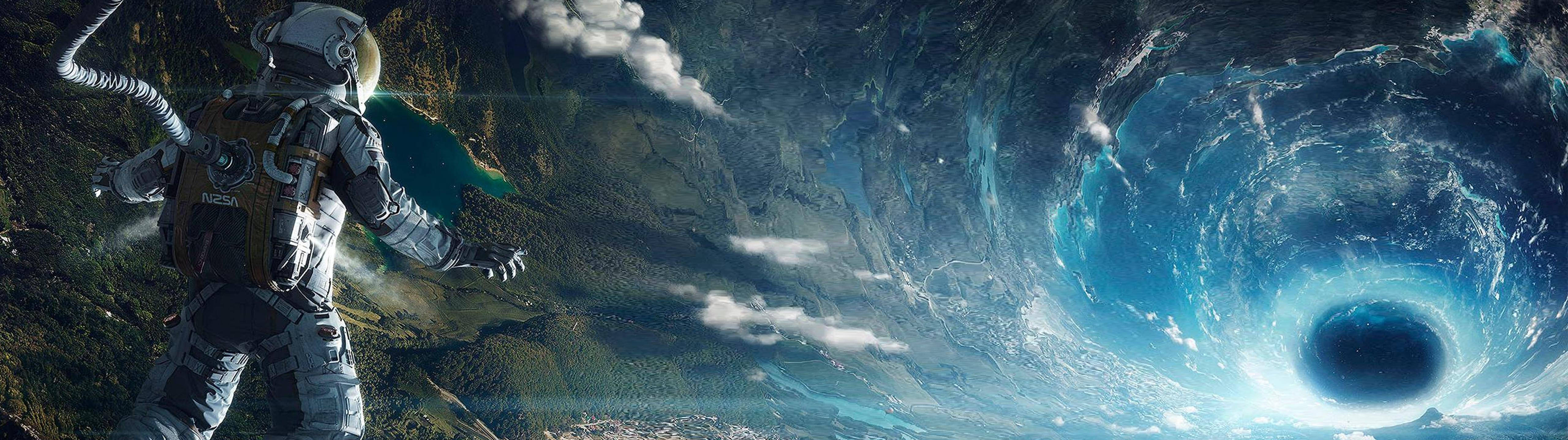 太空人地球黑洞 壁紙