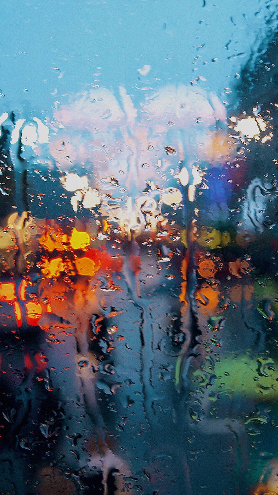 雨水滑落窗戶 iPhone 桌布