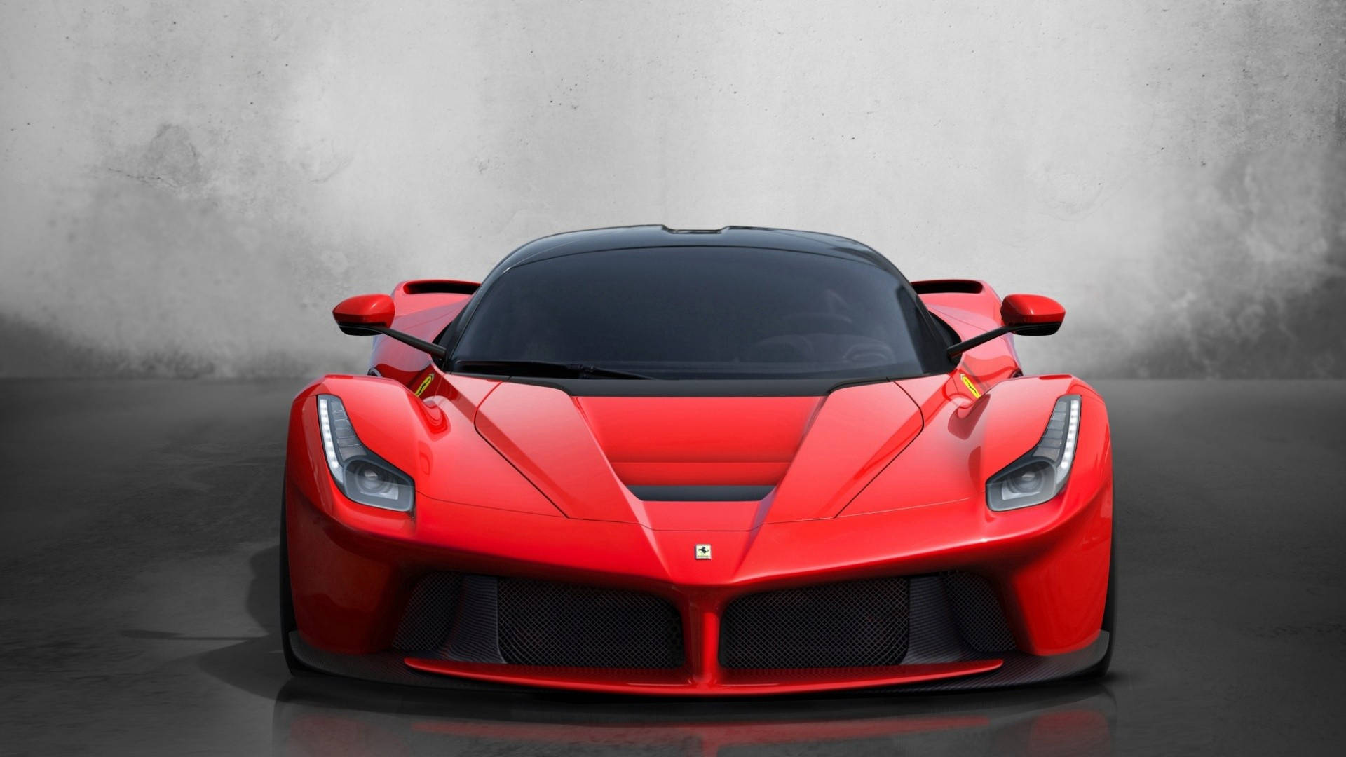 紅色LaFerrari限量版跑車前視圖，復古風格桌布。