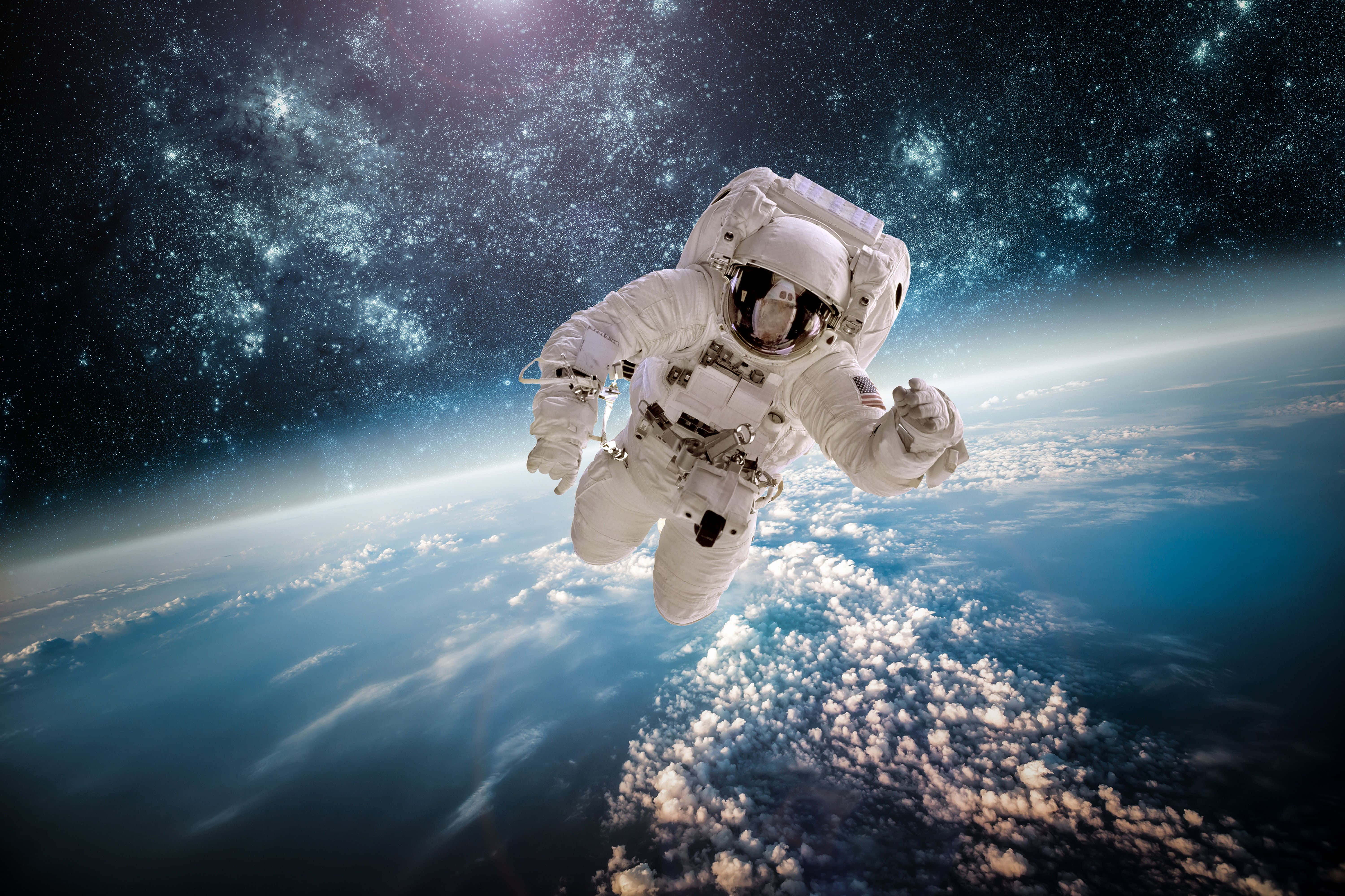 星系與太空人電腦桌布 壁紙