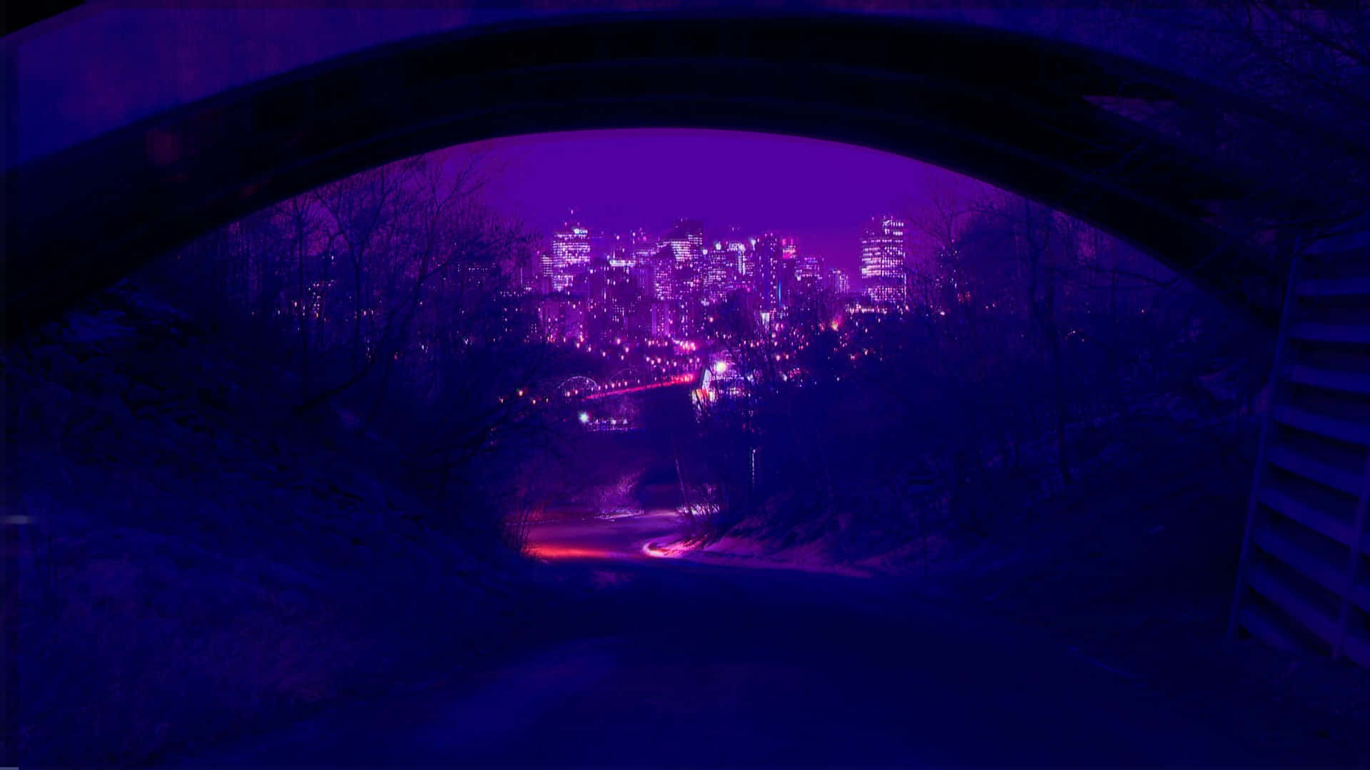 紫色隧道中的城市景觀 壁紙