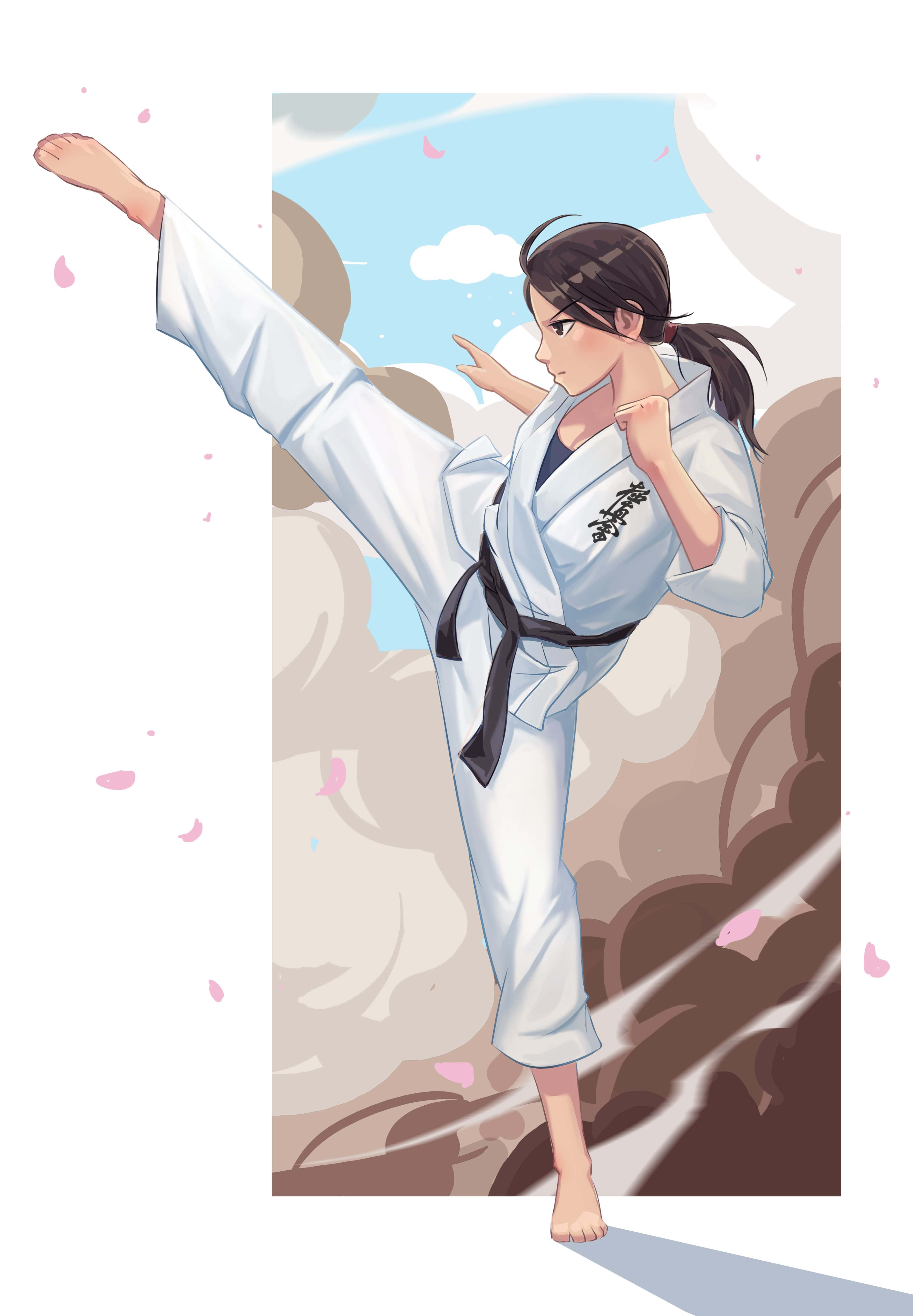 身穿传统白色道服的武术家 壁紙