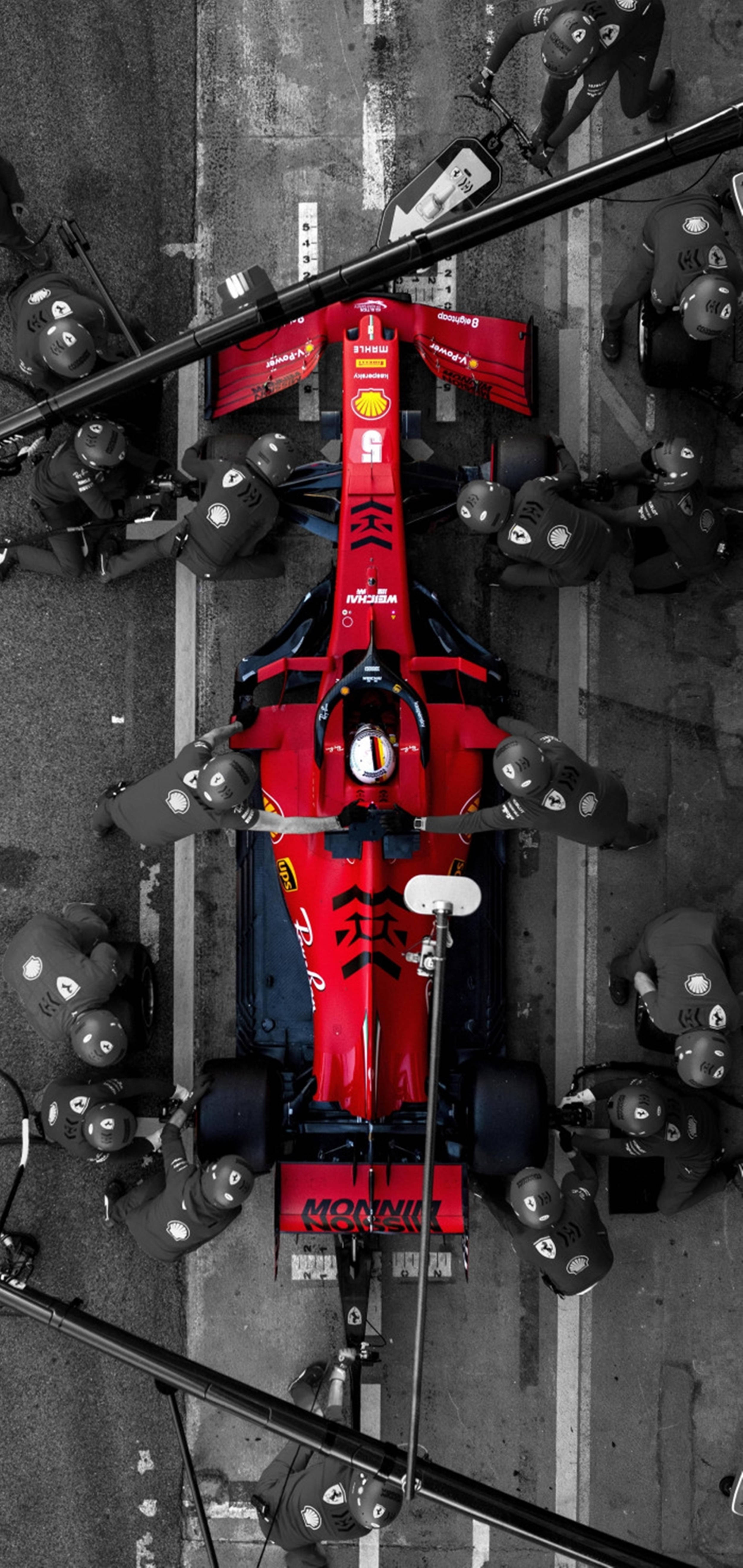 頂視圖：紅色法拉利主題F1手機，造型流暢 壁紙