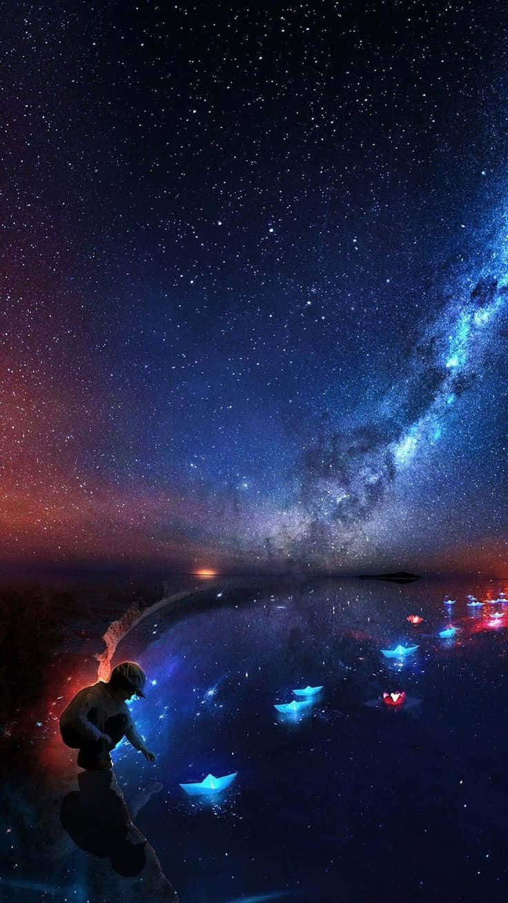 魔法夜空：男孩玩纸船 壁紙