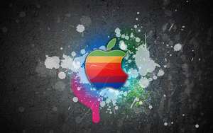 Apple MacBook 標誌的酷炫彩色桌布，灰色牆面帶有油漆潑濺效果