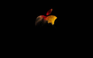 橙红金属色调的苹果标志，MacBook Pro壁纸。