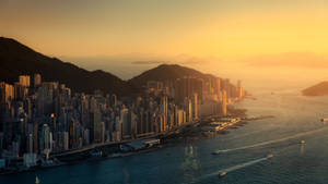 美丽的香港城市景观与日落壁纸。