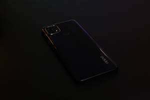 黑色 Oppo 智能手机 — Oppo 壁紙