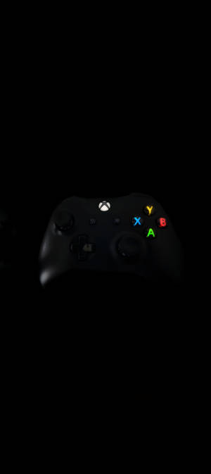 黑色Xbox控制器8K手機 — 1440x3200 壁紙